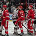 Soo Greyhounds and Guelph Storm shake hands after finishing their series.