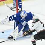 Toronto Maple Leafs goaltender Erik Kallgren makes split save. Kallgren wears a blue and white jersey.