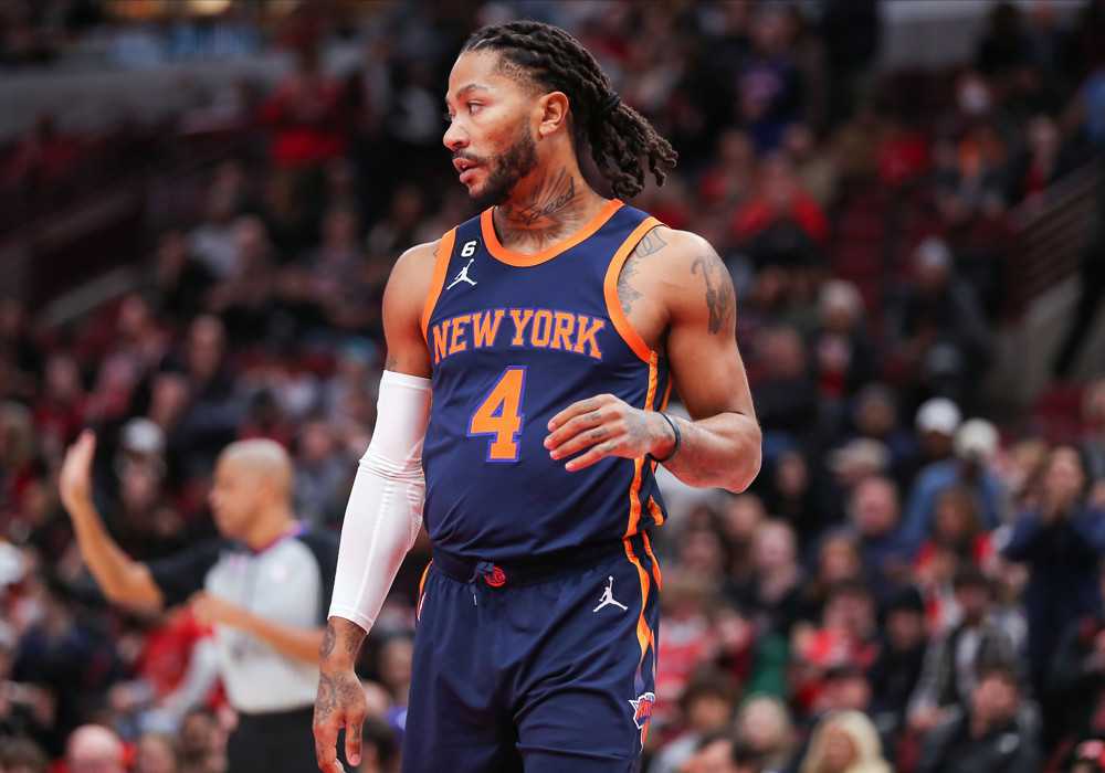 Pascal Siakam is a top-10 NBA player right now 42 Derrick Rose wearing his blue and orange New York Knicks jersey is in the foreground, looking to his right. A referee is in the background making a call.