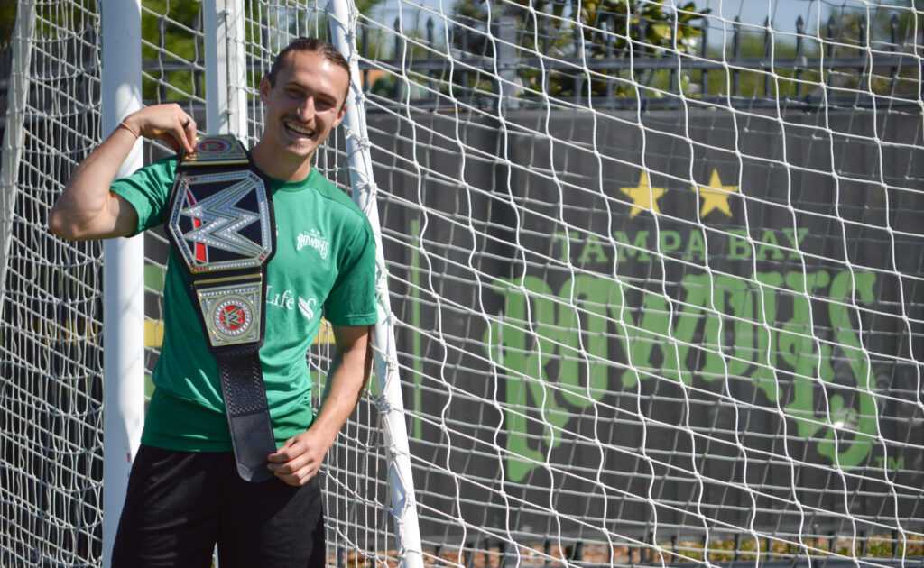 LAFC experience meant world to Rowdies’ star 43 Cal Jennings poses with WWE championship belt