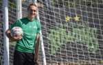 Rowdies' striker Cal Jennings leans against net with ball