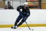 Schaefer skates with the puck