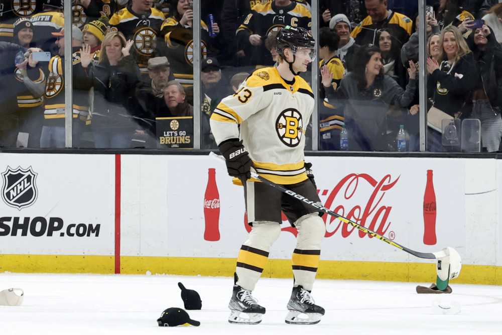 Canadian trio take centre stage on Hockey Day in Canada 44 Canadian Danton Heinen skates past hats on the ice after a hat trick