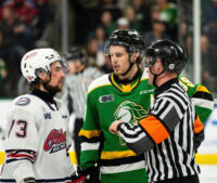 Knights and Generals' players talk to the referee