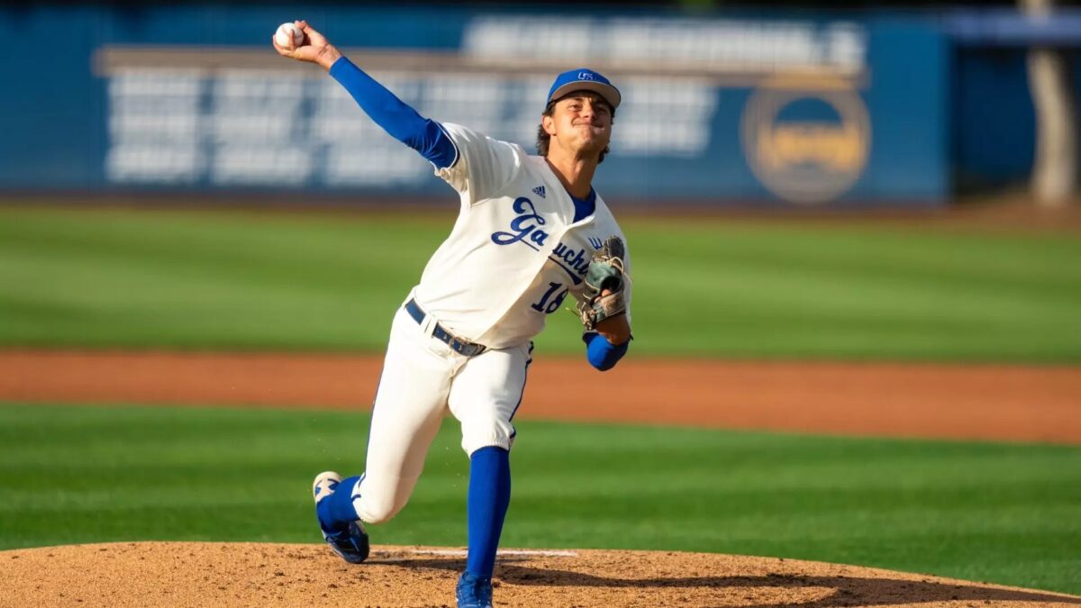 Tyler Bremner pitches in a game