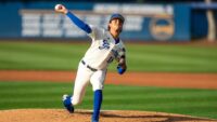 Tyler Bremner pitches in a game