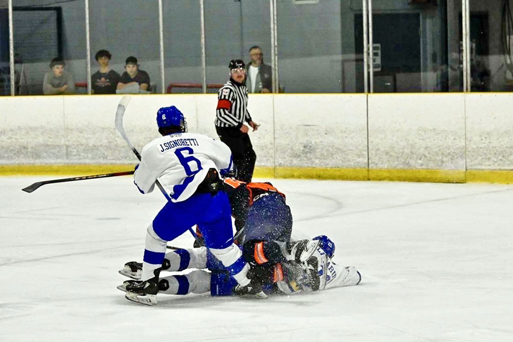 Cubs and Thunderbirds players collide during a game